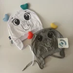 کلاه تک نوزادی تریکو بند دار گرم مدل عروسکی2 - تصویر 6